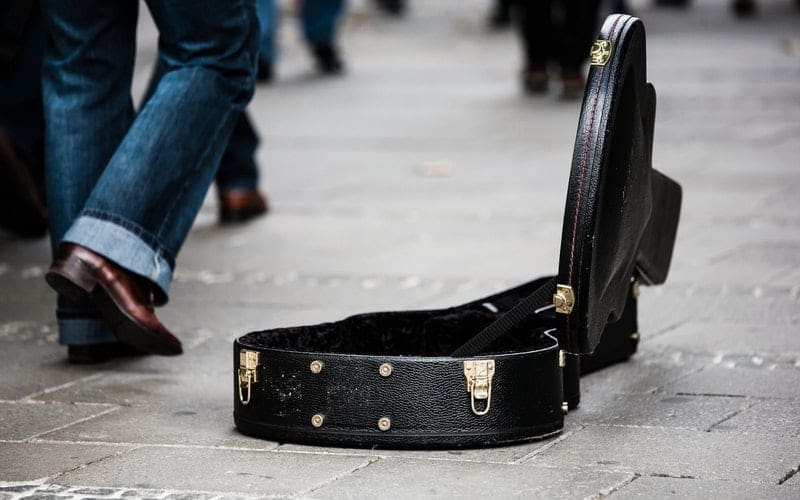 suitcase street busker